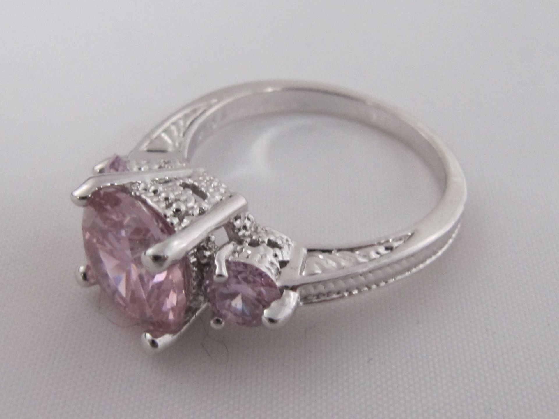 10k White Gold Filled with Pink Sapphires. Size P.