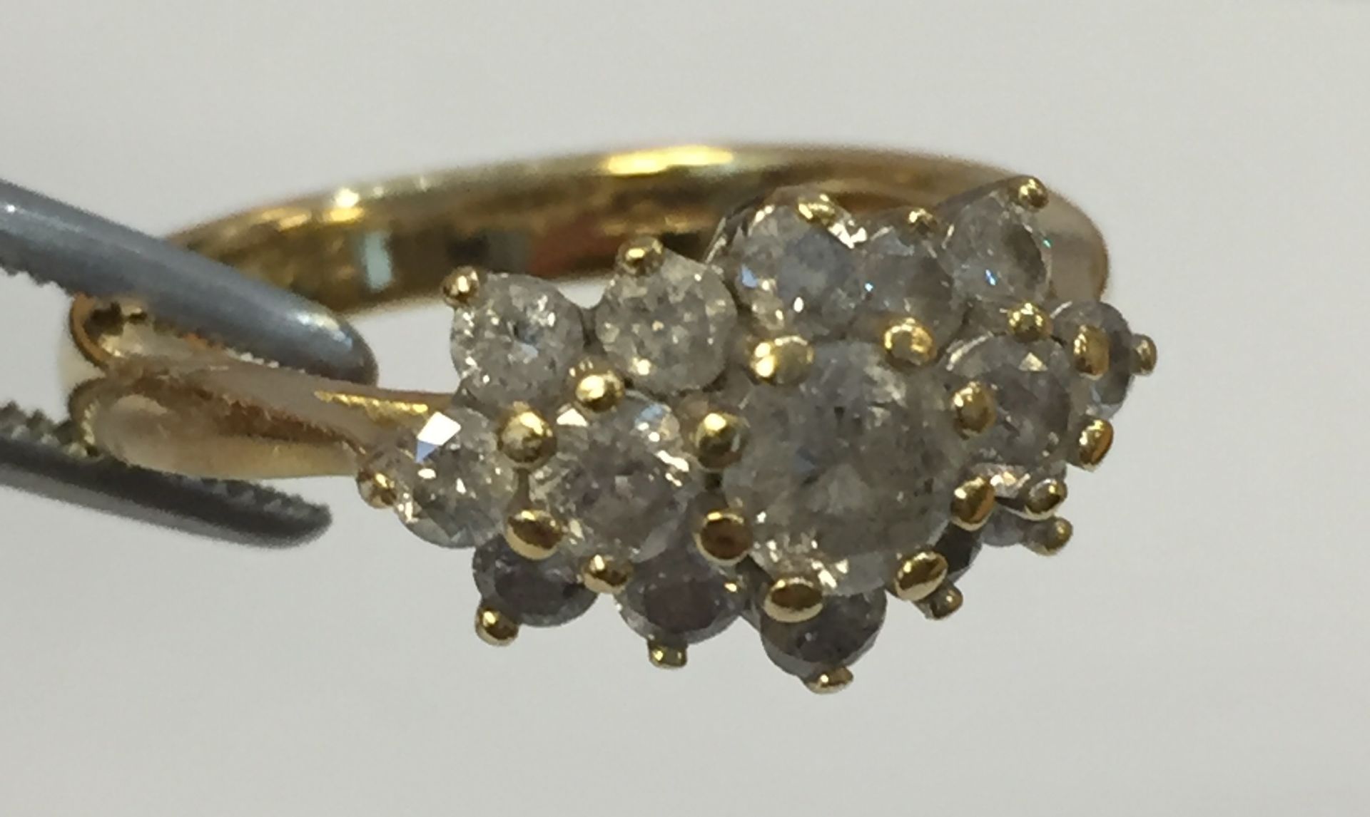 18ct Gold Cluster Ring Comprising Three Rows Of Round Brilliant Cut Diamonds