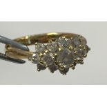 18ct Gold Cluster Ring Comprising Three Rows Of Round Brilliant Cut Diamonds