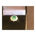 18ct Emerald and 1ct of Diamond Ring