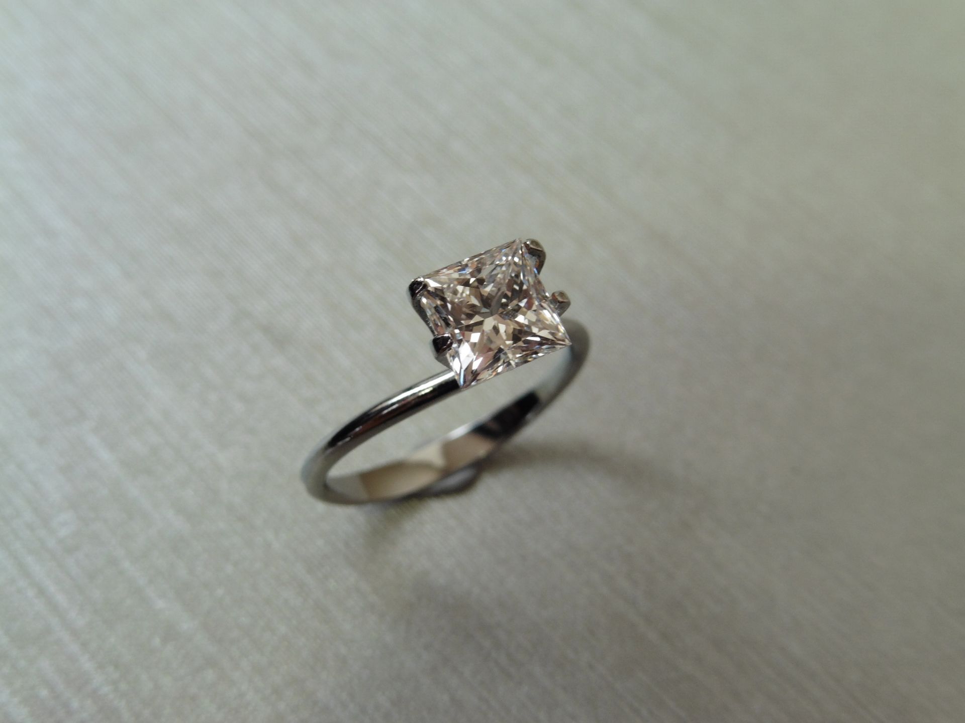 1.51ct single princess cut diamond. Measurements 6.33 x 6.47 x 4.49mm. G colour and VS1 clarity.