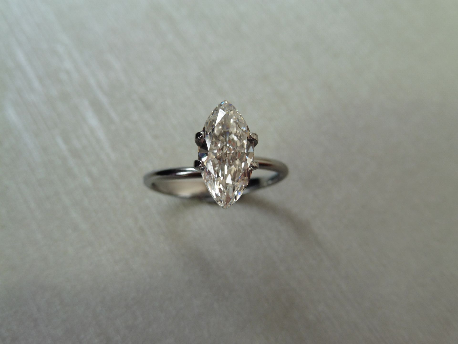 1.73ct single marquise cut diamond. Measurements 12.90 x 6.44 x 3.32mm. F colour and SI2 clarity.