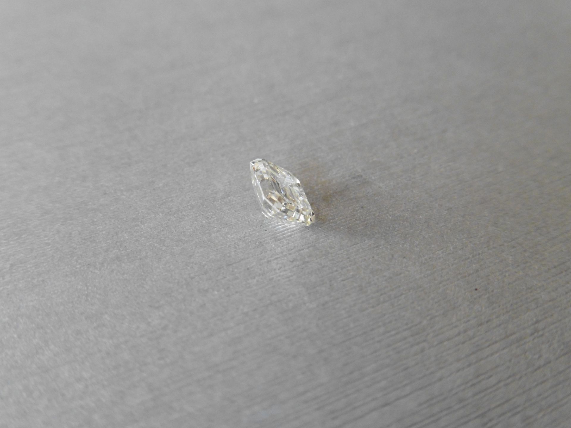 0.92ct single radiant cut diamond. Measures 6.00 x 5.3mm. J colour and VVS clarity. Valued at £6950. - Image 2 of 5