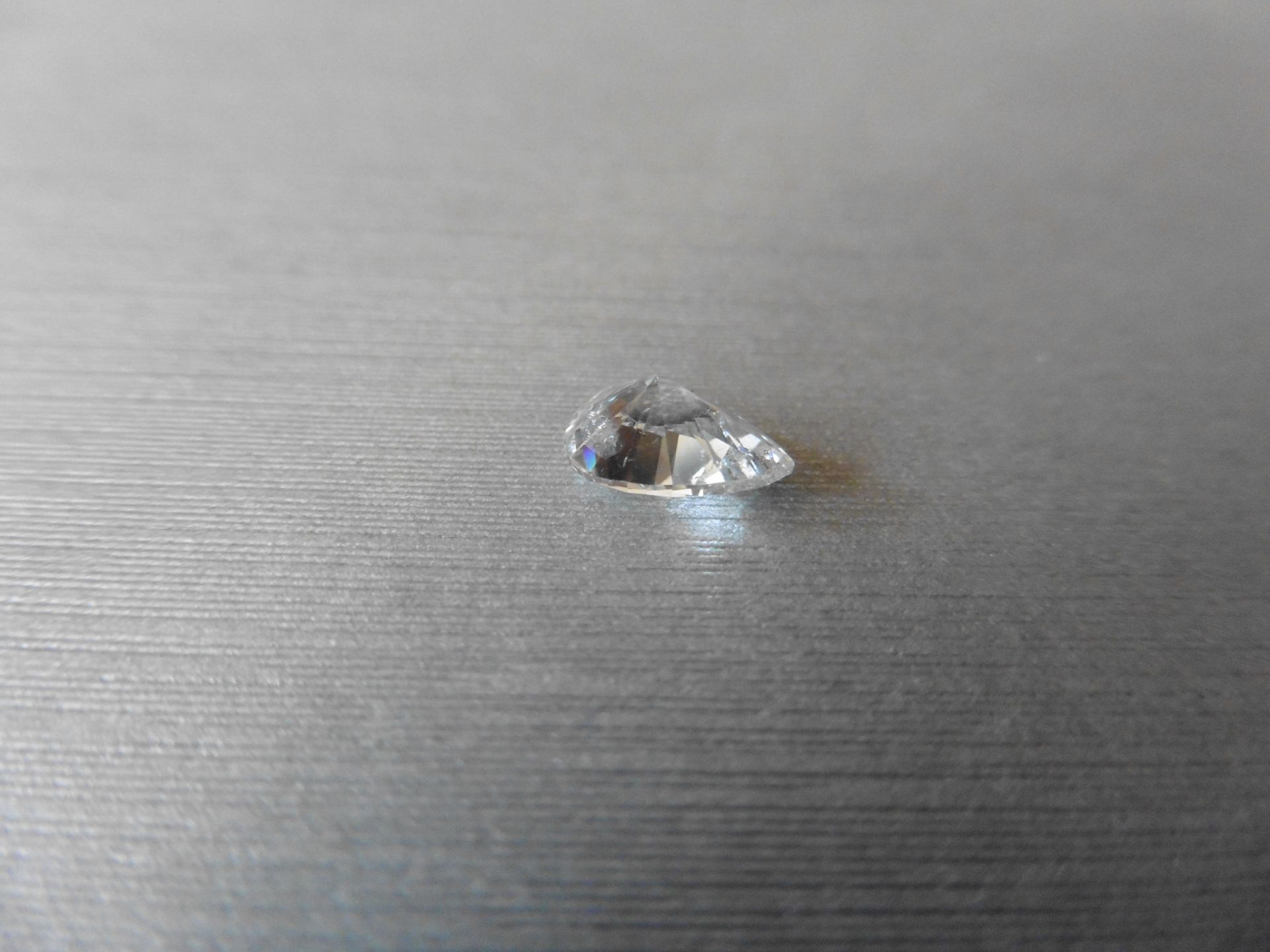 1.27ct single pear cut diamond G colour S12 clarity. 8.30 x 5.72 x 4.16. Suitable for mounting in - Image 3 of 5