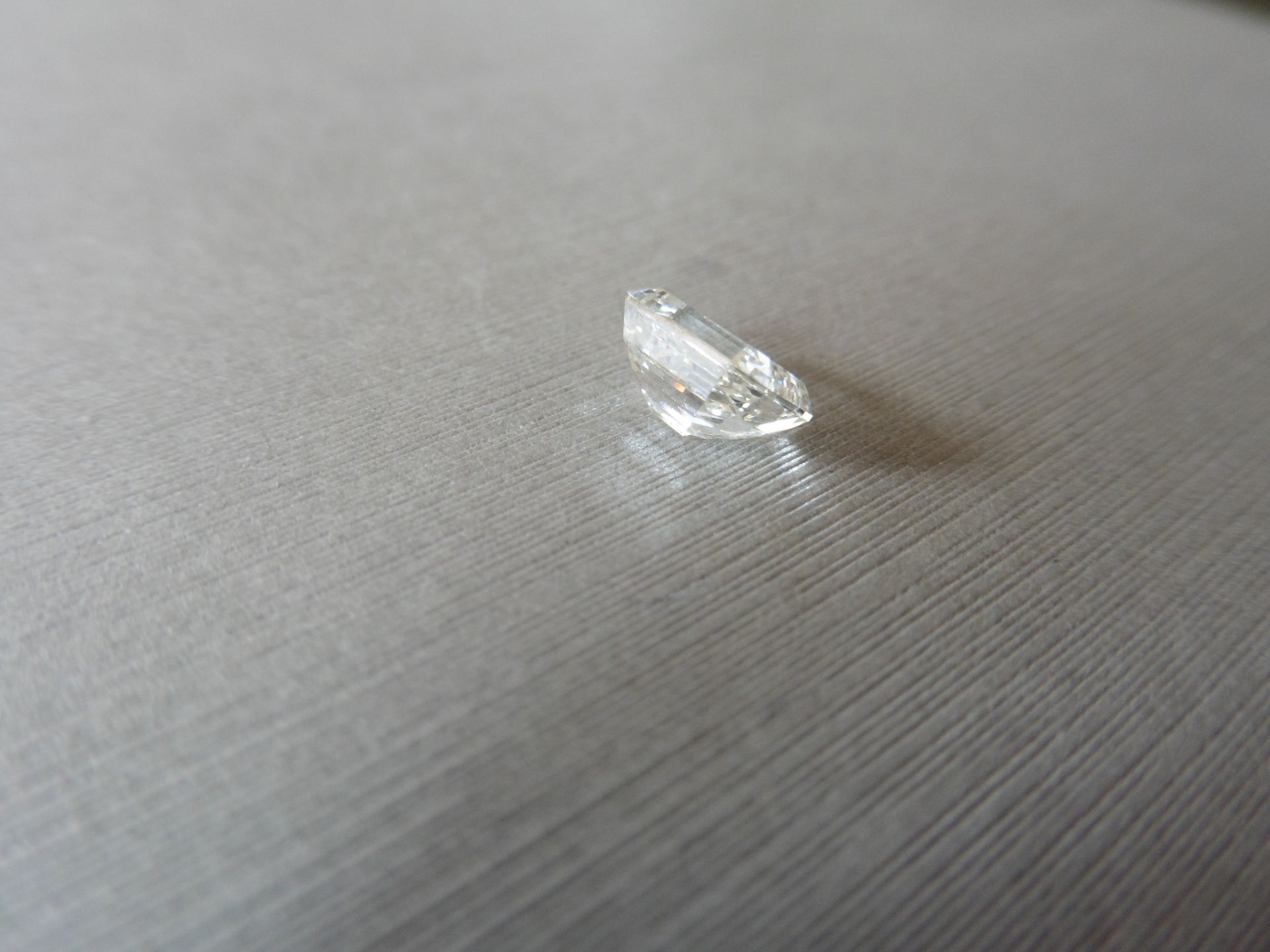 2.01ct single emerald cut diamond, measures 8.06 x 6.08 x 4.23mm J colour, SI3 clarity. No - Image 2 of 5