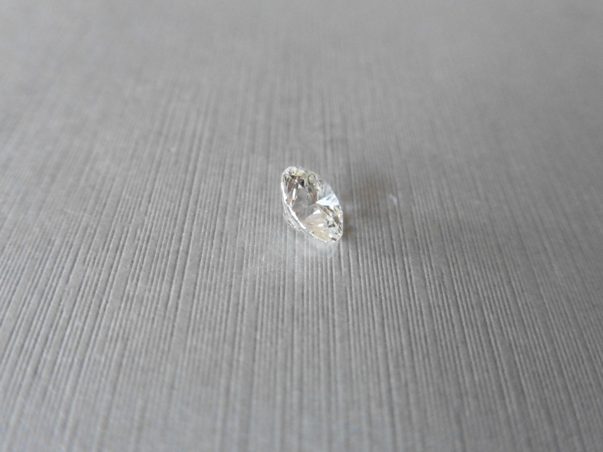 1.15ct single brilliant cut diamond. Measurements 6.70 x 6.72 x 4.19mm. J colour, si clarity. Valued - Image 2 of 6
