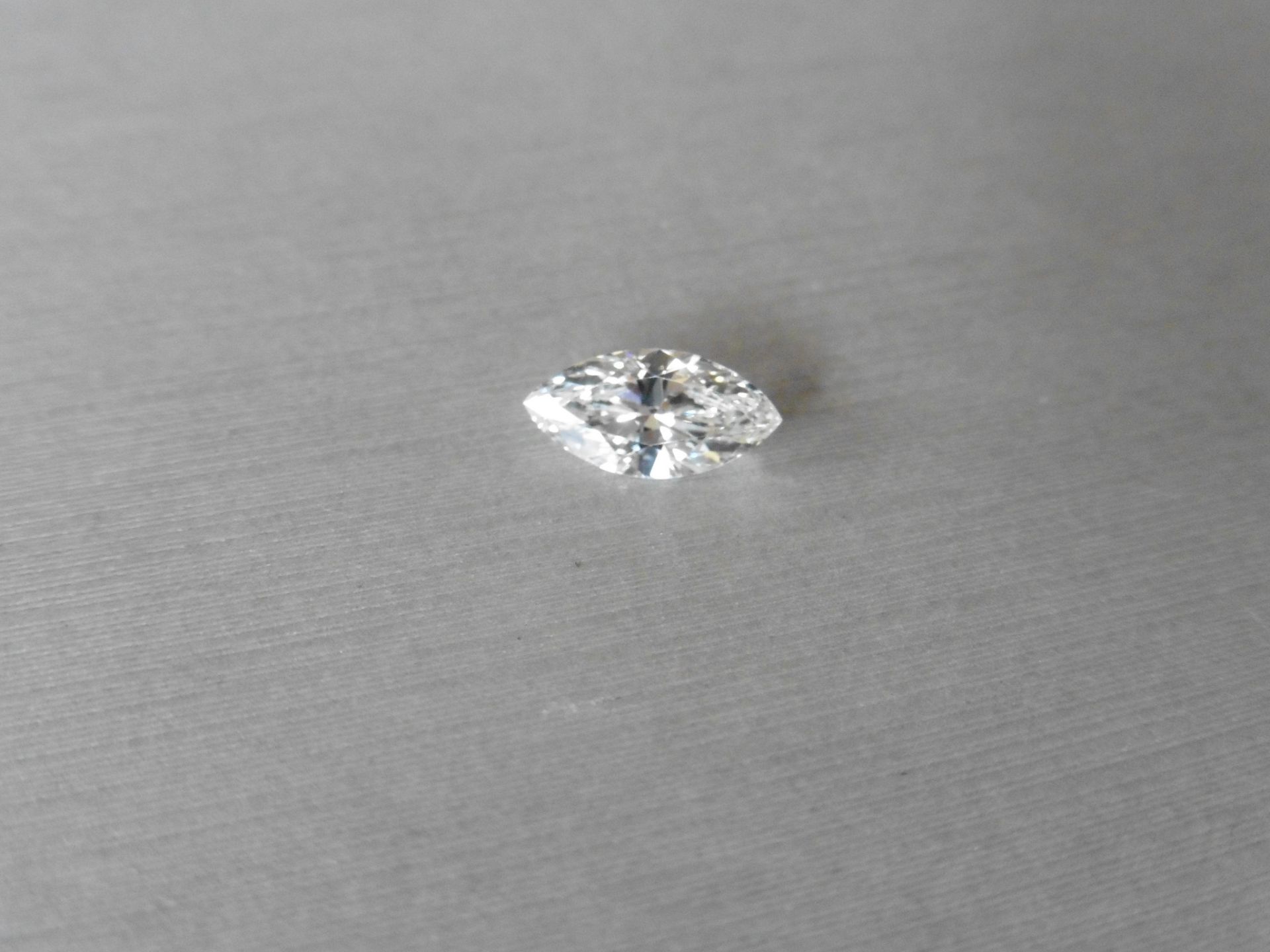 1.74ct single marquise cut diamond. Measurements 12.30 x 6.21 x 3.96mm. H colour, VS1 clarity.