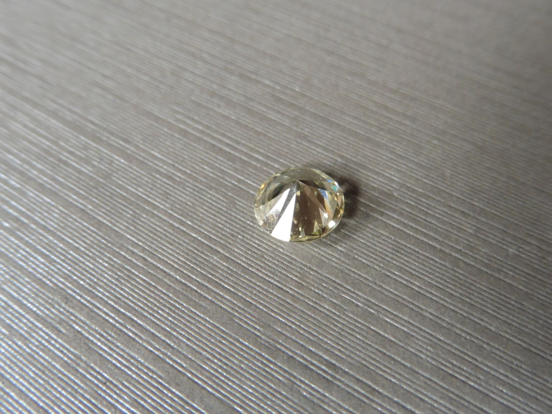 1.08ct loose brilliant cut diamond measuring 6.74 x 3.9mm. K Colour and VS1 clarity. Valued at £ - Image 4 of 6