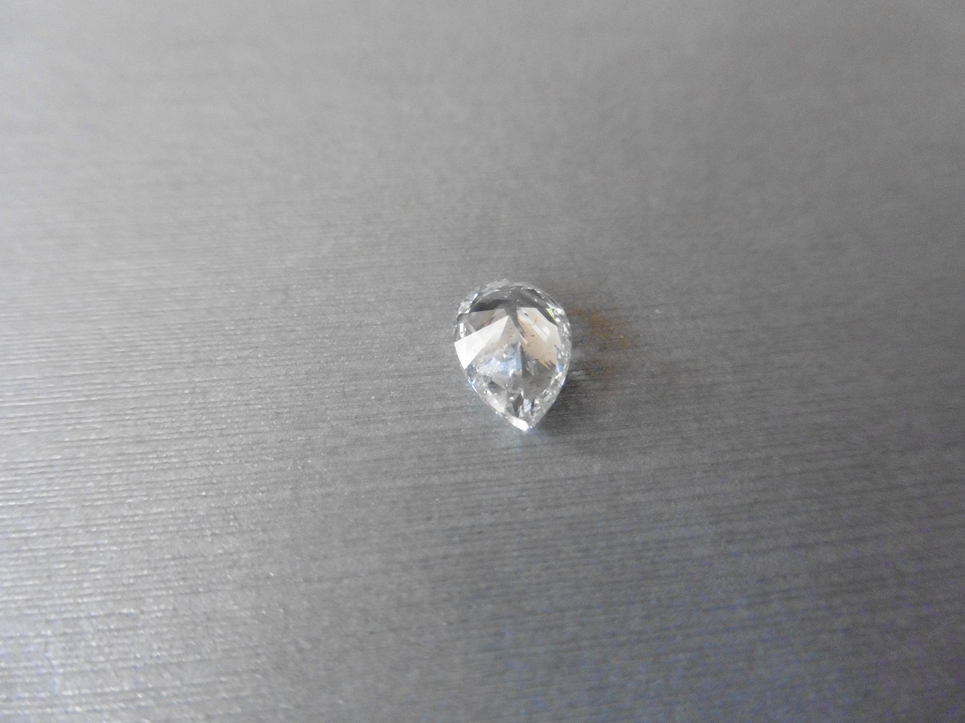 1.70ct single pear cut diamond H colour S12 clarity. 9.96 x 6.66 x 4.09. Suitable for mounting in - Image 3 of 5