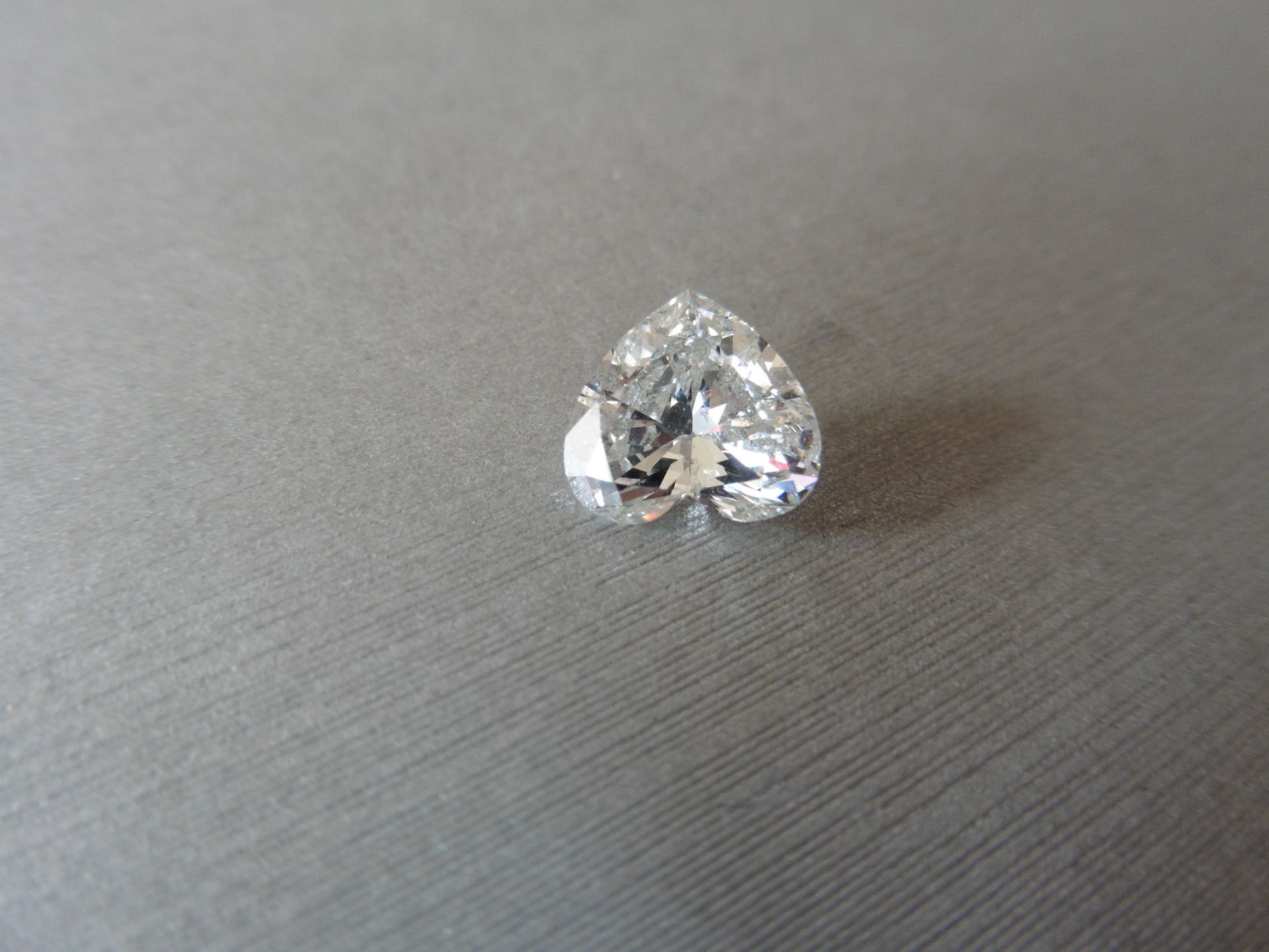 2.66ct single heart shaped diamond measurements 9.83 x 8.84 x 4.91mm. I Colour, SI2 Clarity. No