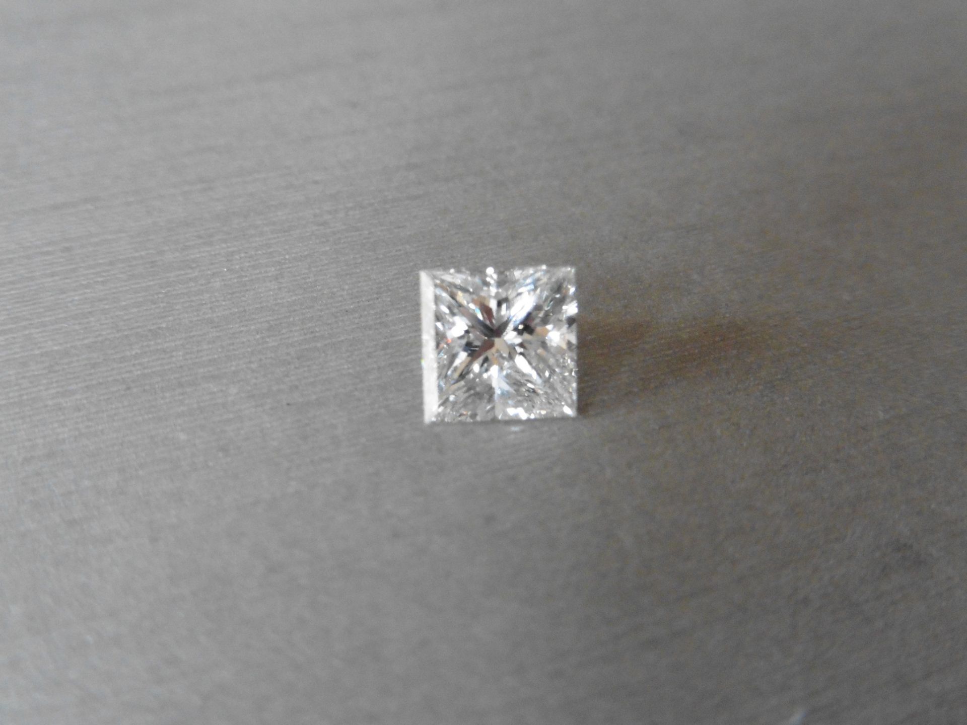 1.75ct single princess cut diamond. Measurements 6.75 x 6.68 x 4.86mm. G colour and VS1 clarity.