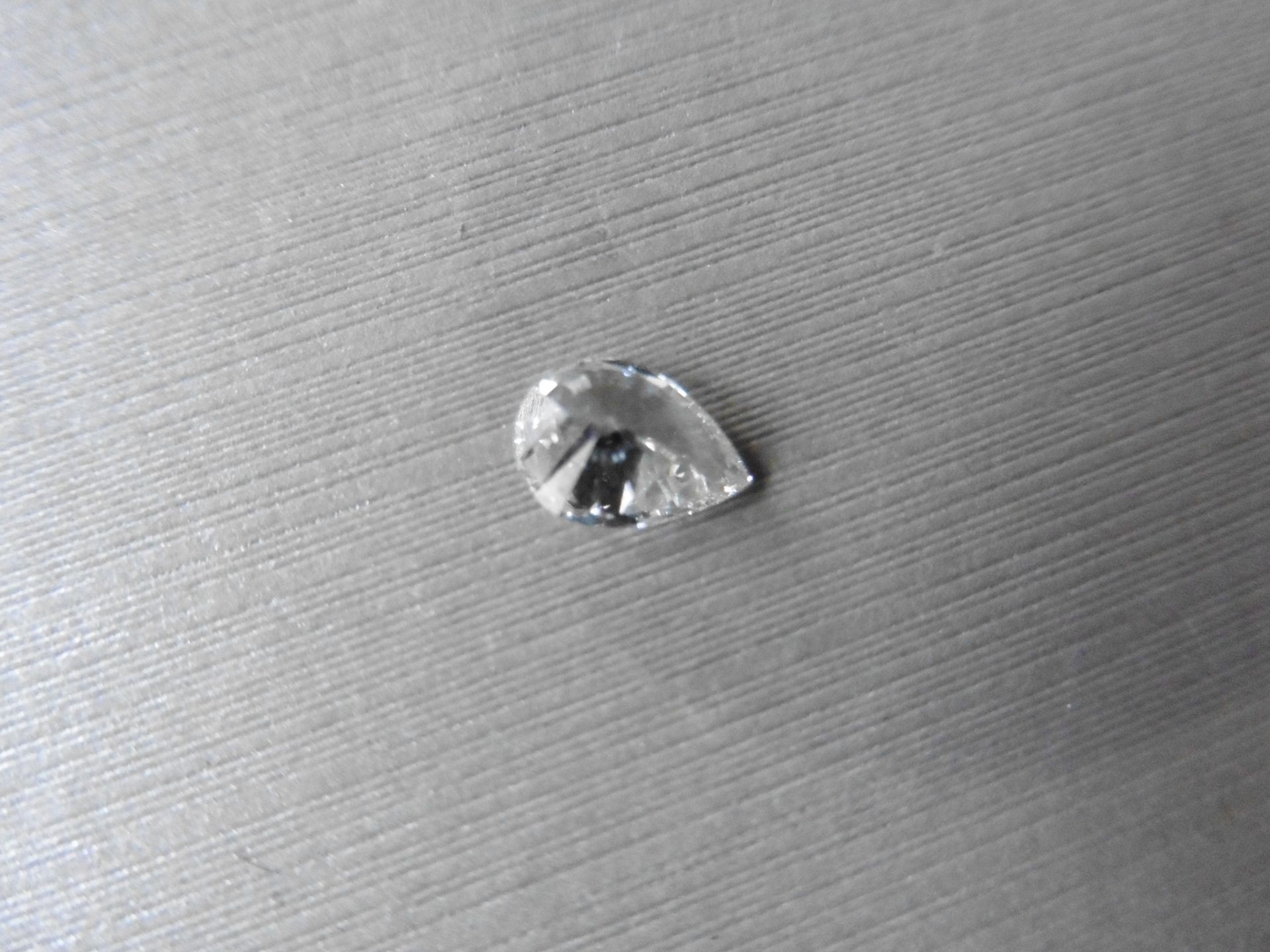 1.01ct single pear shaped diamond. Measures 8.18 x 5.82 x 3.78mm. H Colour, SI2 clarity. No - Image 4 of 6