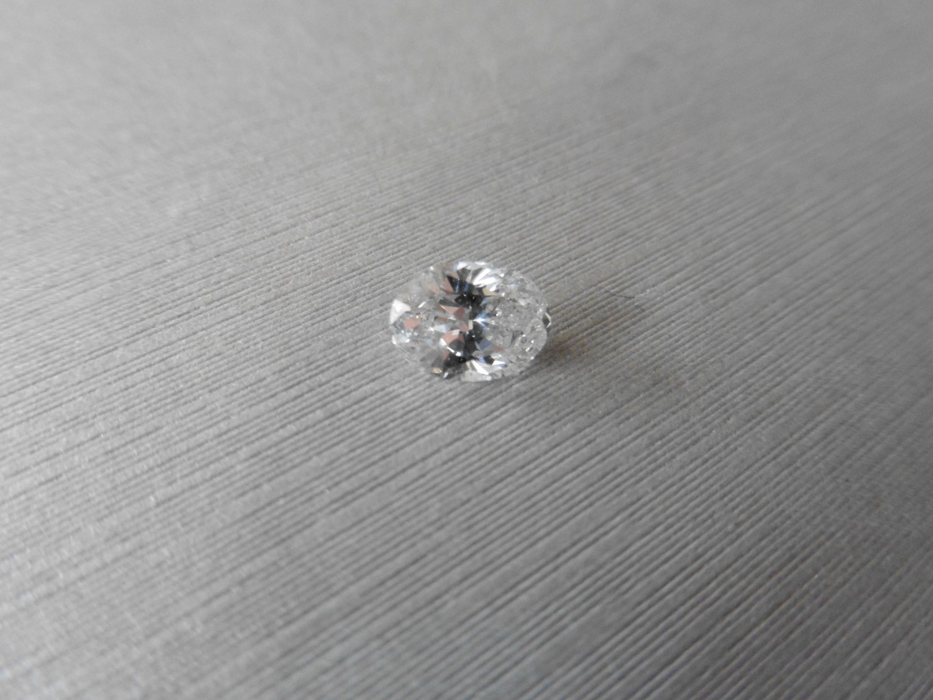 1.16ct single oval cut diamond. Measures 7.89 x 5.64 x 3.80. H colour and SI2 clarity. No