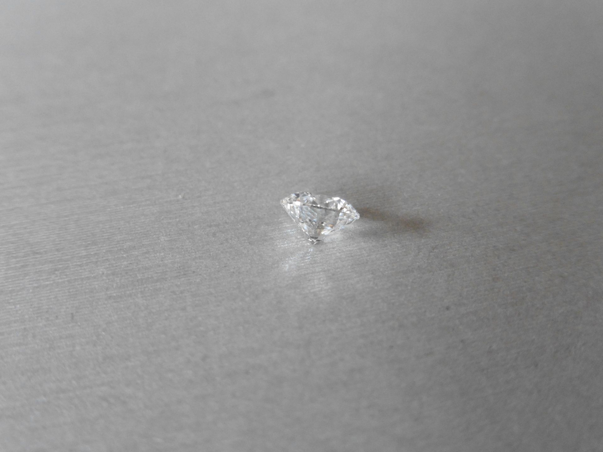 1.07ct single brilliant cut diamond, E colour SI1 clarity. 6.53 mm x 6.55mm x 4.02mm. Suitable for - Image 2 of 6