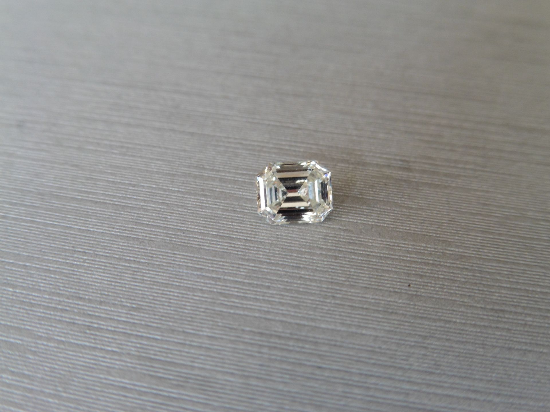 0.92ct single radiant cut diamond. Measures 6.00 x 5.3mm. J colour and VVS clarity. Valued at £6950. - Image 5 of 5