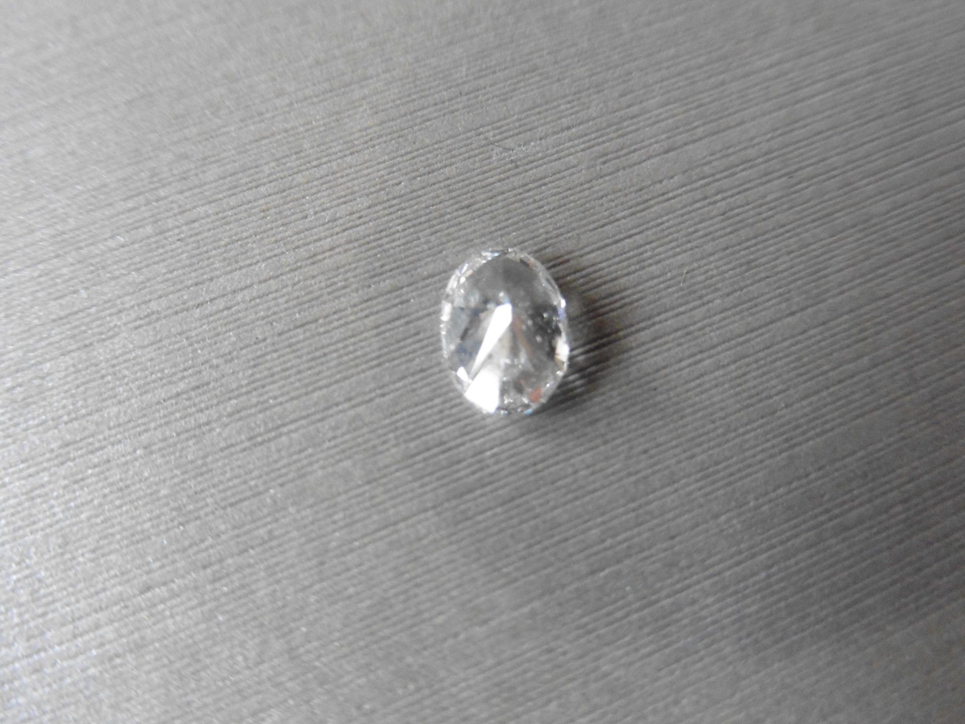 1.16ct single oval cut diamond. Measures 7.89 x 5.64 x 3.80. H colour and SI2 clarity. No - Image 3 of 4