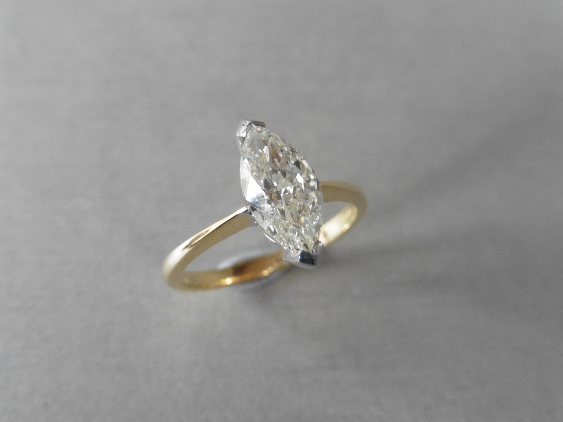 1.51ct marquise cut diamond ring. H colour and Si2 clarity. Secured in a 2 claw white gold setting