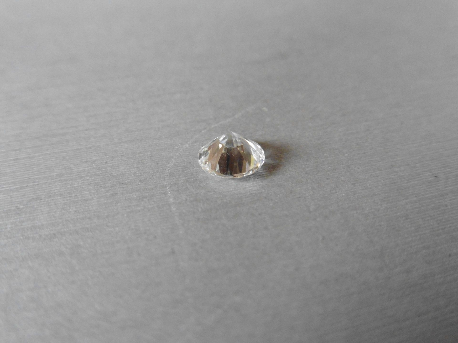 1.07ct single brilliant cut diamond, H colour SI1 clarity. 6.54 mm x 6.58mm x 4.01mm. Suitable for - Image 3 of 6