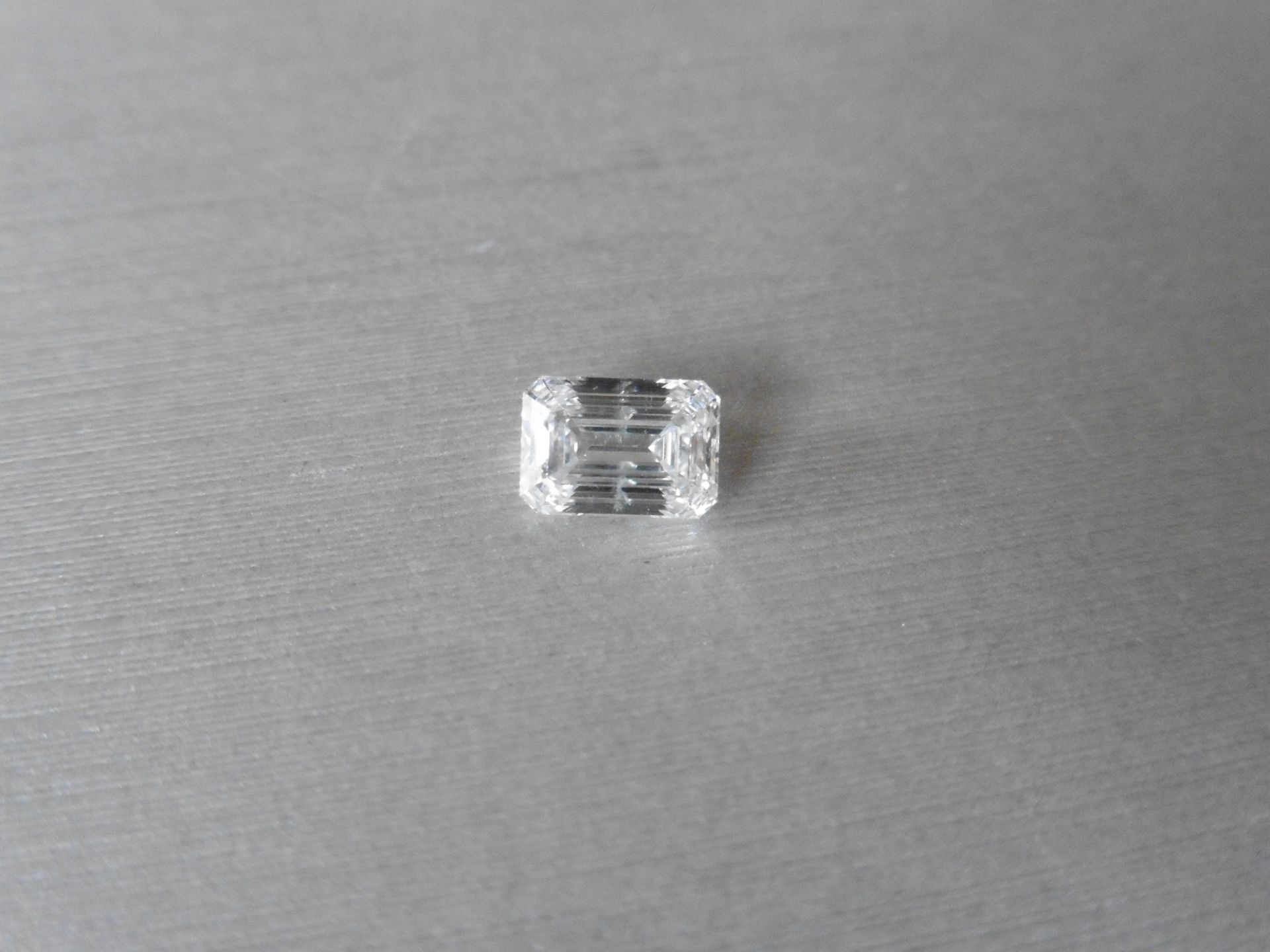 1.50ct single emerald cut diamond. Measures 7.67 x 5.41 x 3.53mm. F colour SI2 clarity. Valued at £
