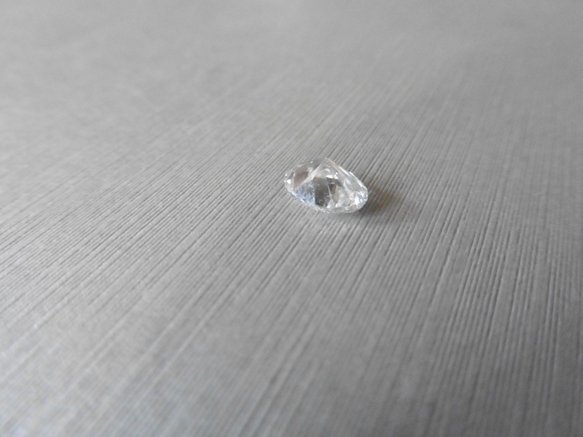 1.16ct single oval cut diamond. Measures 7.89 x 5.64 x 3.80. H colour and SI2 clarity. No - Image 4 of 4