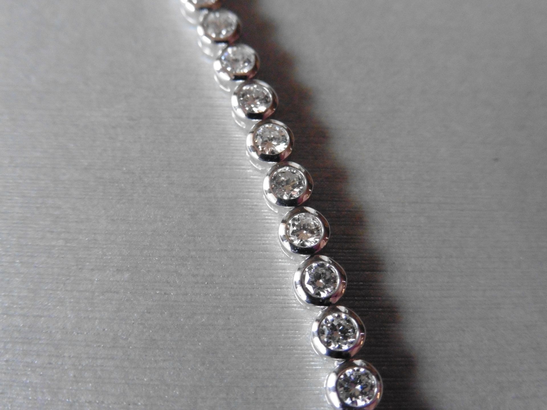 18ct white gold diamond tennis style bracelet set with brilliant cut diamonds weighing 5.60ct - Image 2 of 4