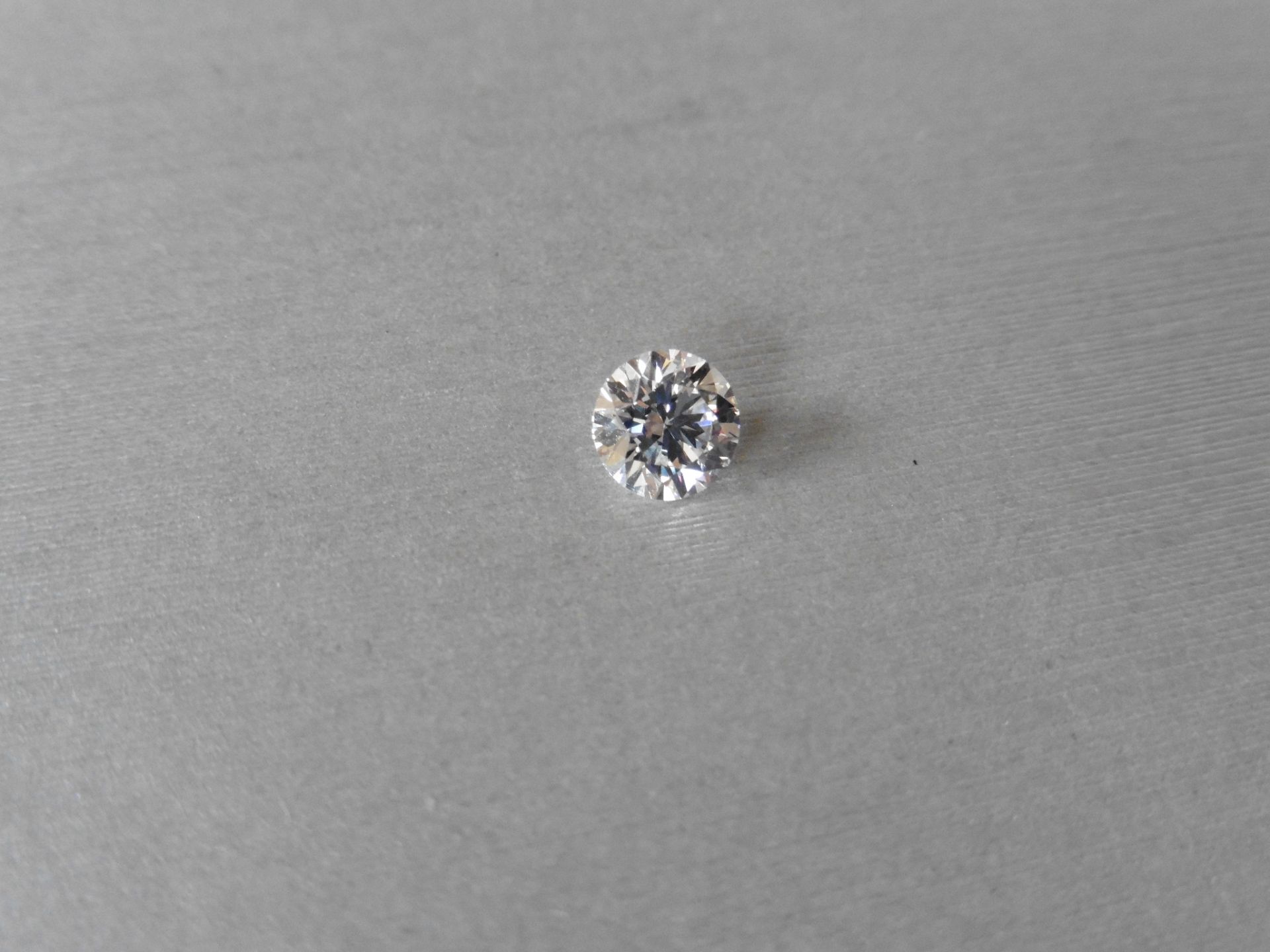 1.07ct single brilliant cut diamond, G colour VS2 clarity. 6.51 mm x 6.52mm x 4.05mm. Suitable for