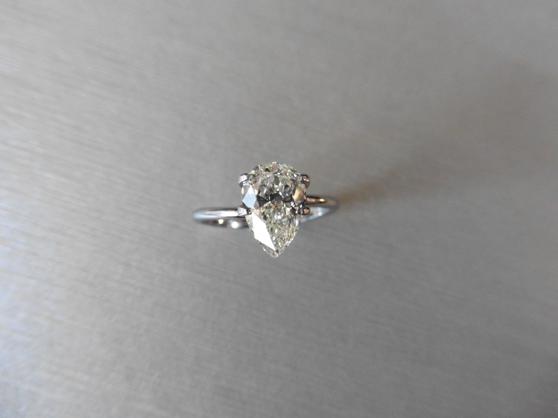 1.47ct single pear cut diamond K colour VS1 clarity. 9.61 x 6.46 x 3.80. Suitable for mounting in