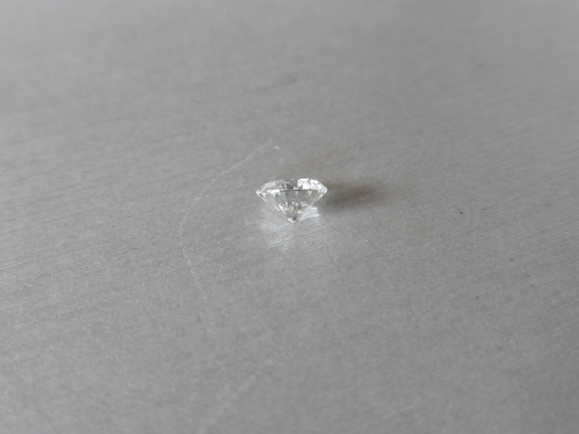 1.07ct single brilliant cut diamond, H colour SI1 clarity. 6.54 mm x 6.58mm x 4.01mm. Suitable for - Image 2 of 6