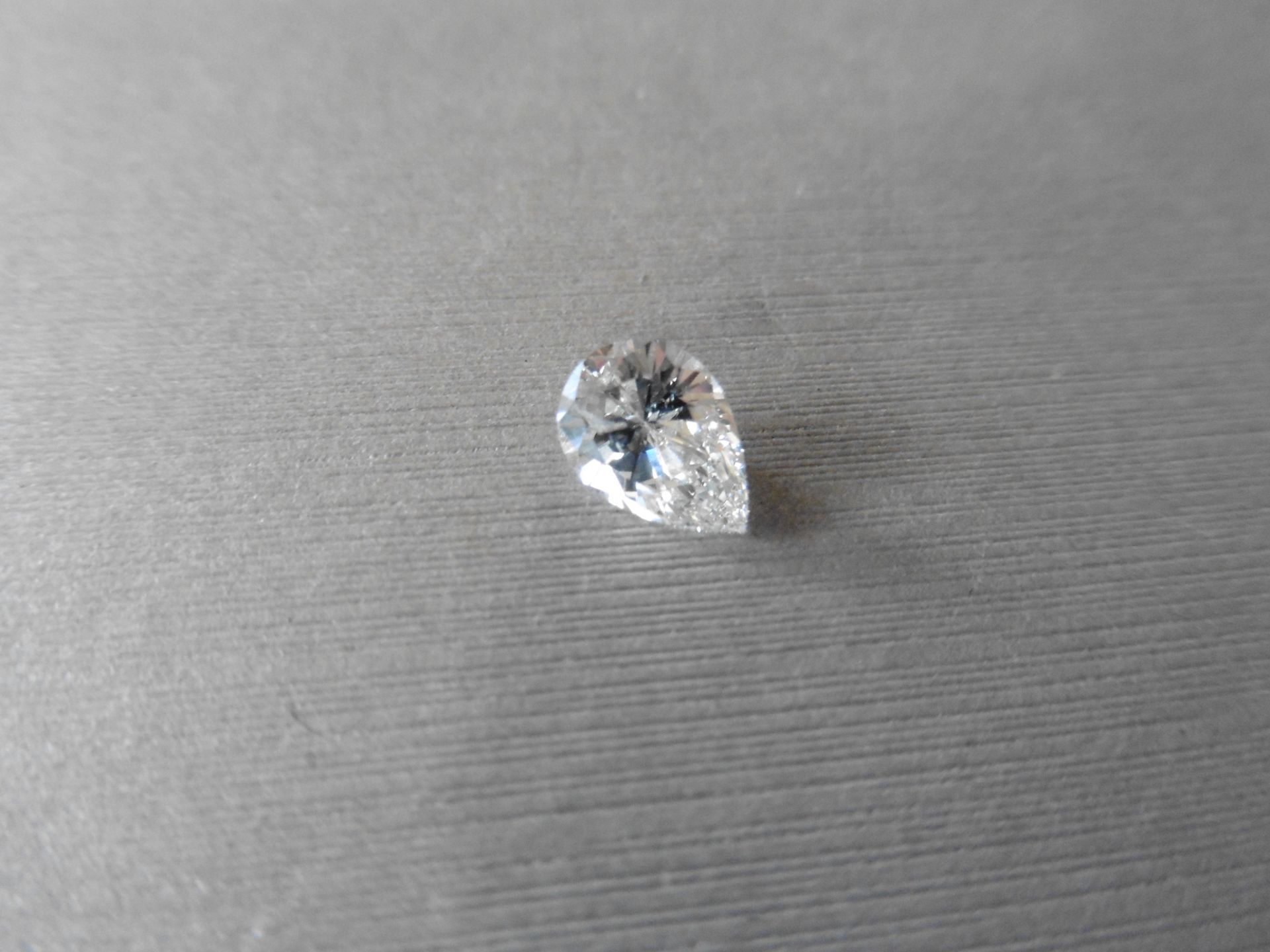 1.01ct single pear shaped diamond. Measures 8.18 x 5.82 x 3.78mm. H Colour, SI2 clarity. No - Image 6 of 6