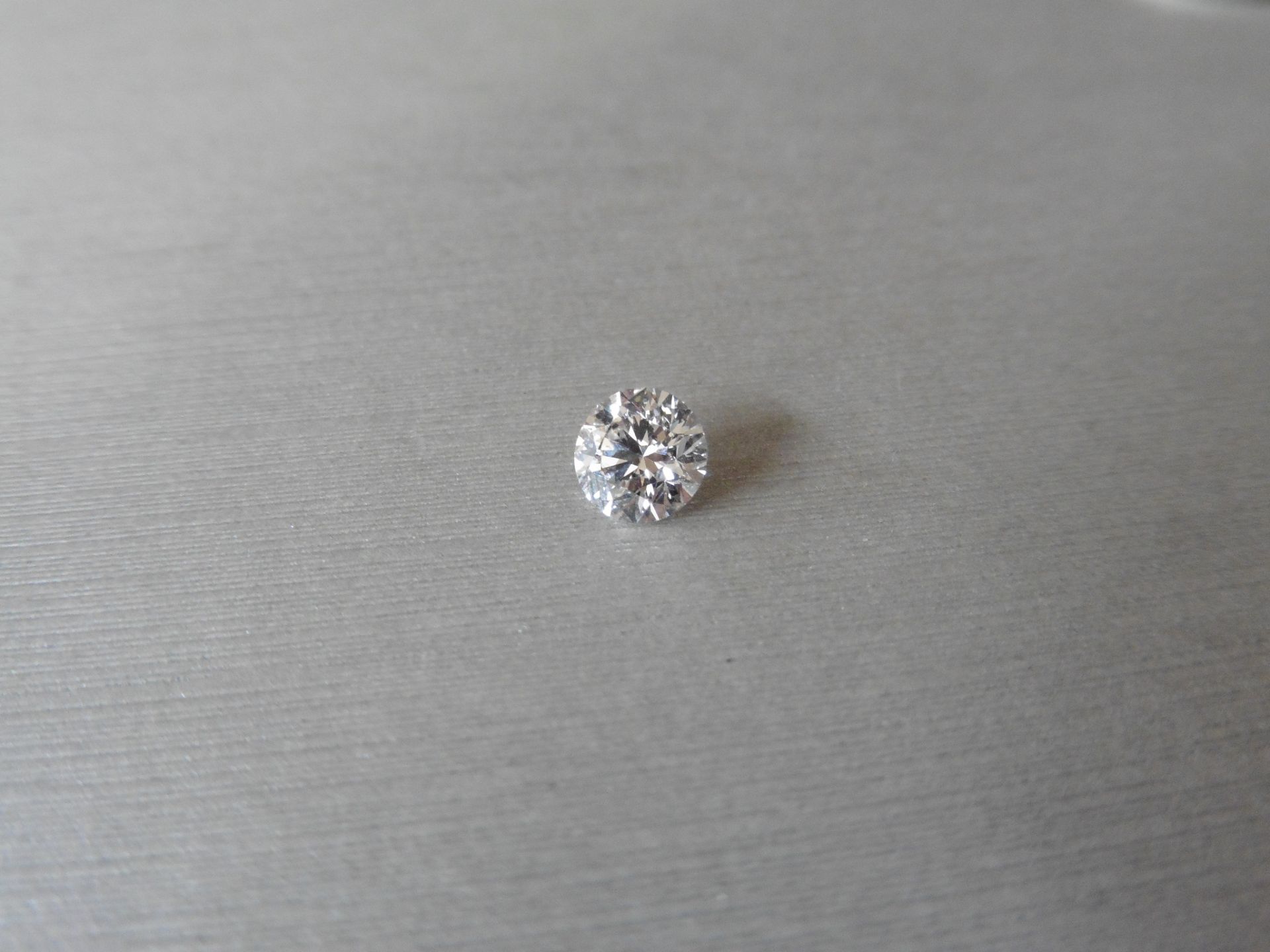 1.01ct single brilliant cut diamond, G colour SI1 clarity. 6.37mm x 6.41mm x 4.03mm. Suitable for