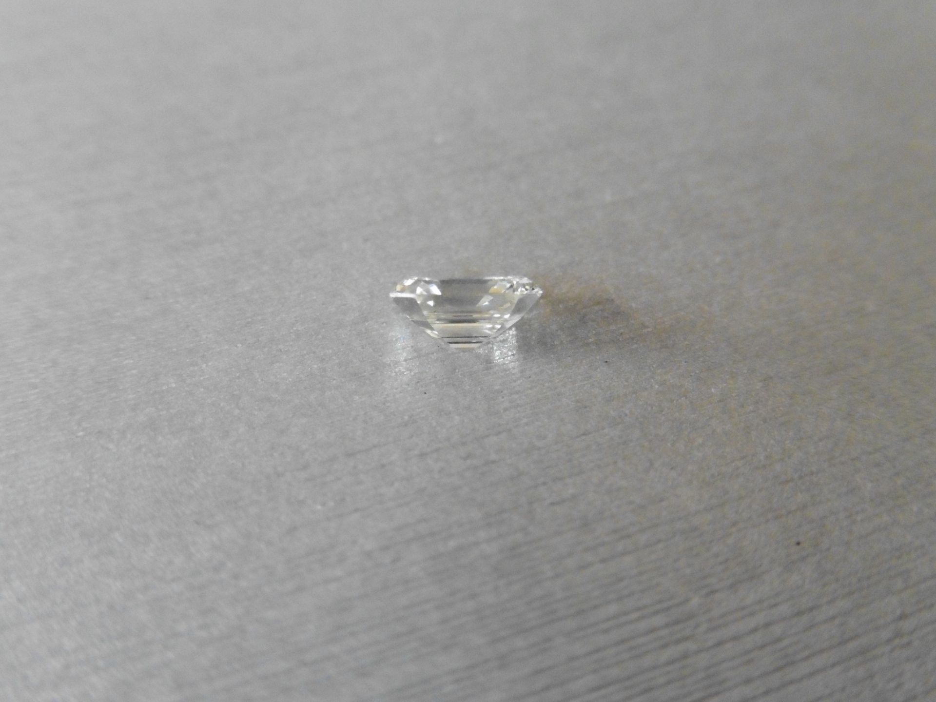 0.92ct single radiant cut diamond. Measures 6.00 x 5.3mm. J colour and VVS clarity. Valued at £6950. - Image 3 of 5