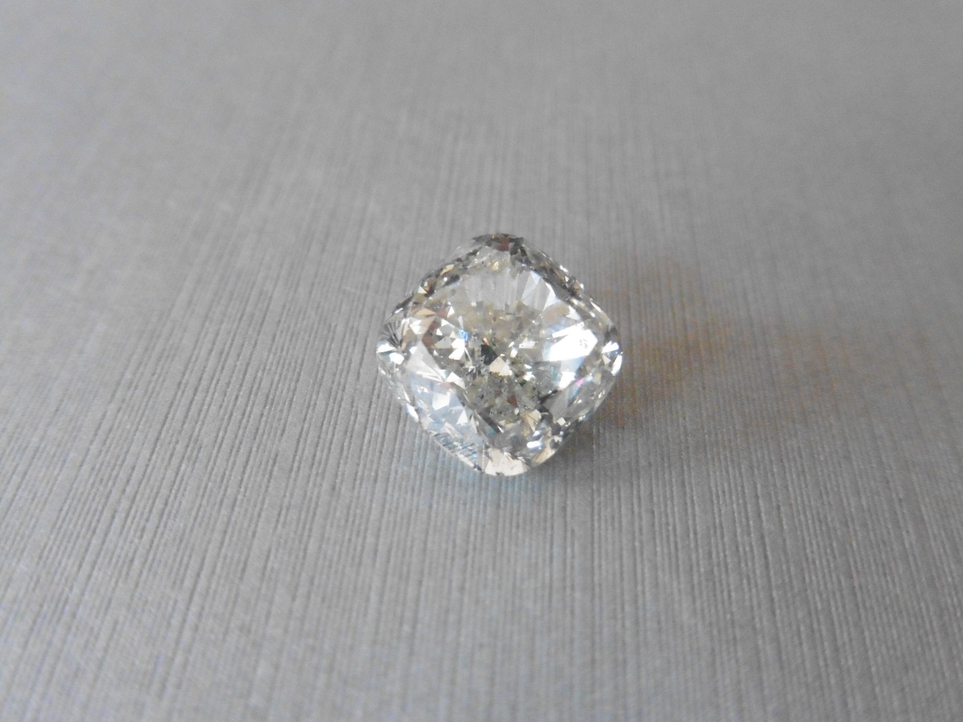 10.10ct single old cut cushion diamond , K colour SI2 clarity. Suitable for mounting in a ring or