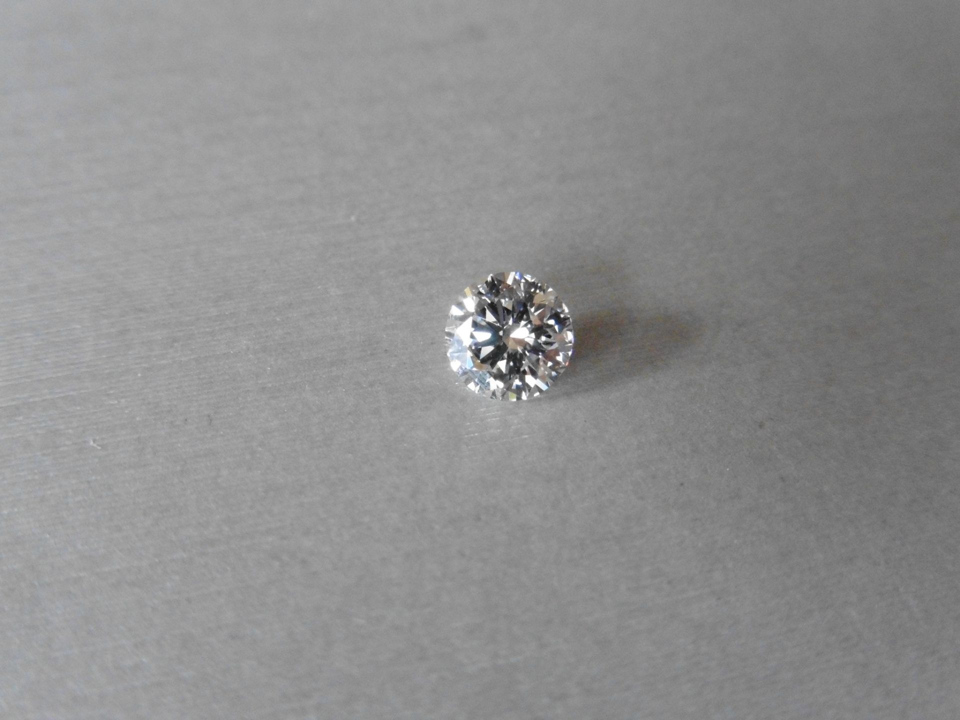 1.07ct single brilliant cut diamond, E colour SI1 clarity. 6.53 mm x 6.55mm x 4.02mm. Suitable for