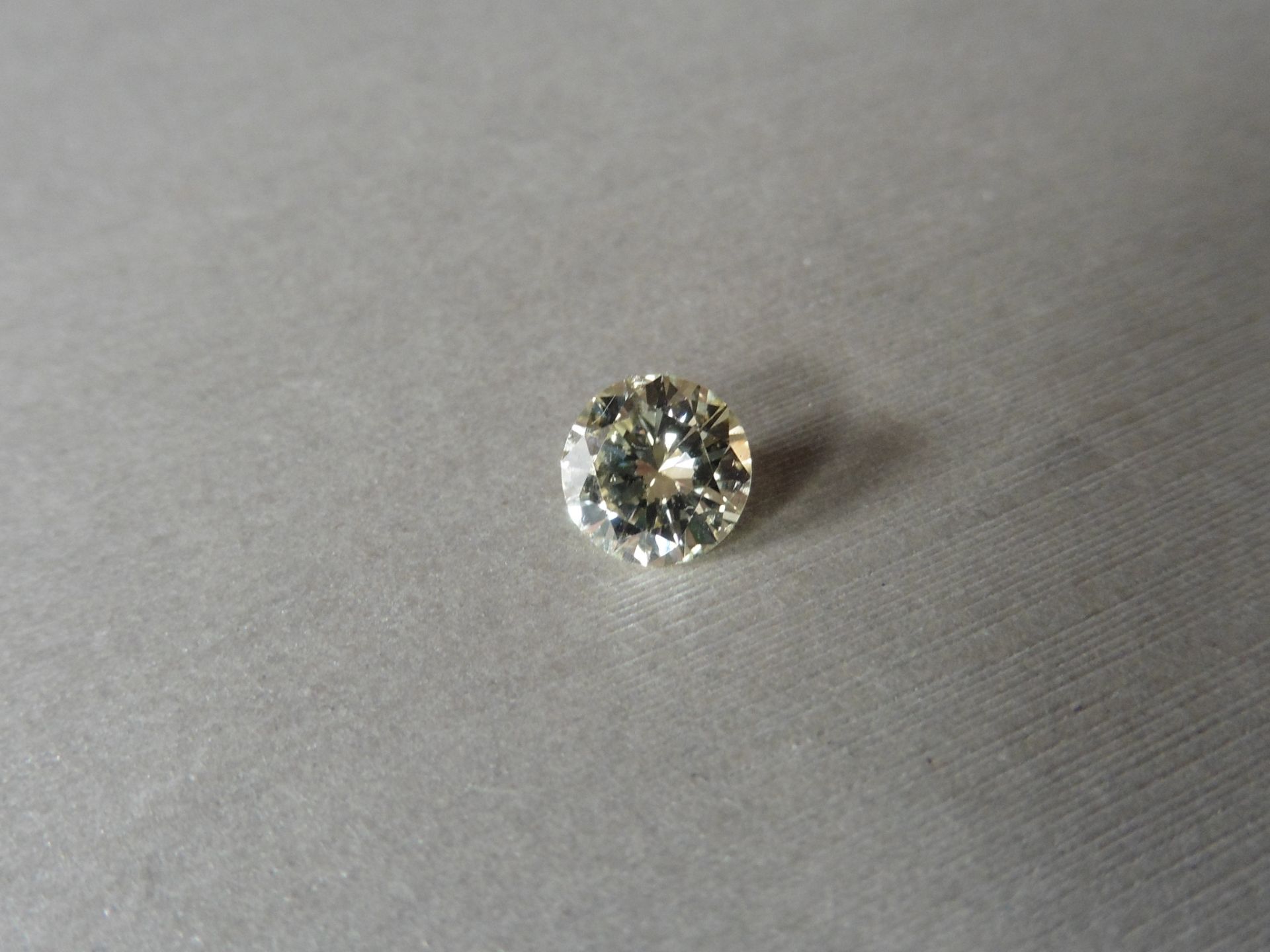 1.08ct loose brilliant cut diamond measuring 6.74 x 3.9mm. K Colour and VS1 clarity. Valued at £