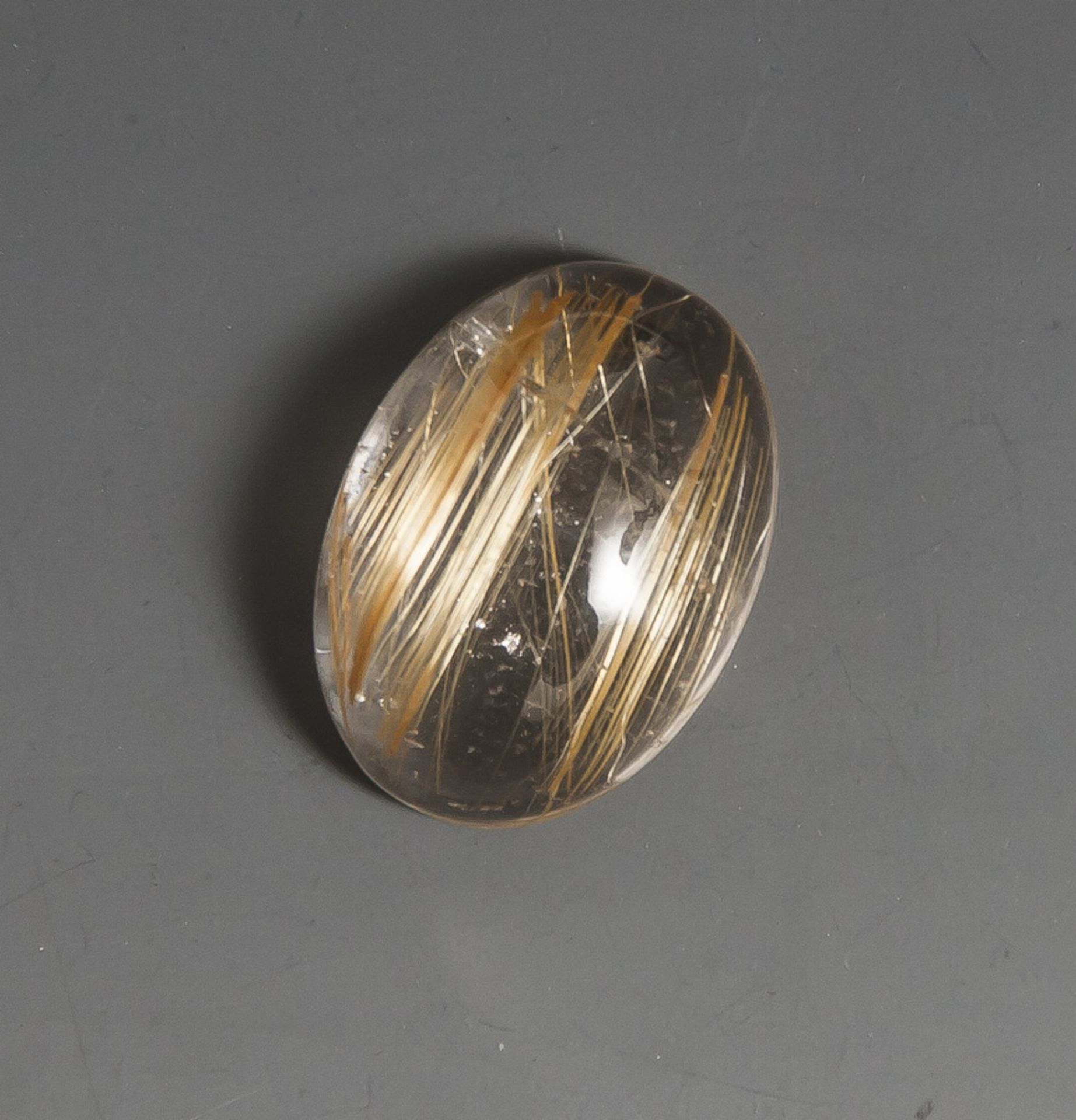 Rutilquarz, Cabochon, ca. 18 x 13 x 7 mm.