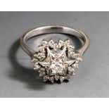 Damenring, Weißgold 750, sternförmiger Ringkopf, ausgefasst mit 1 gr. Brillanten, ca. 0,10ct/H/vsi