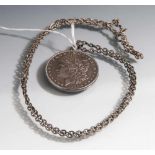 1 Silberdollar, USA 1885, als Anhänger mit Kette gearbeitet, schauseitig Freiheitskopfnach links mit