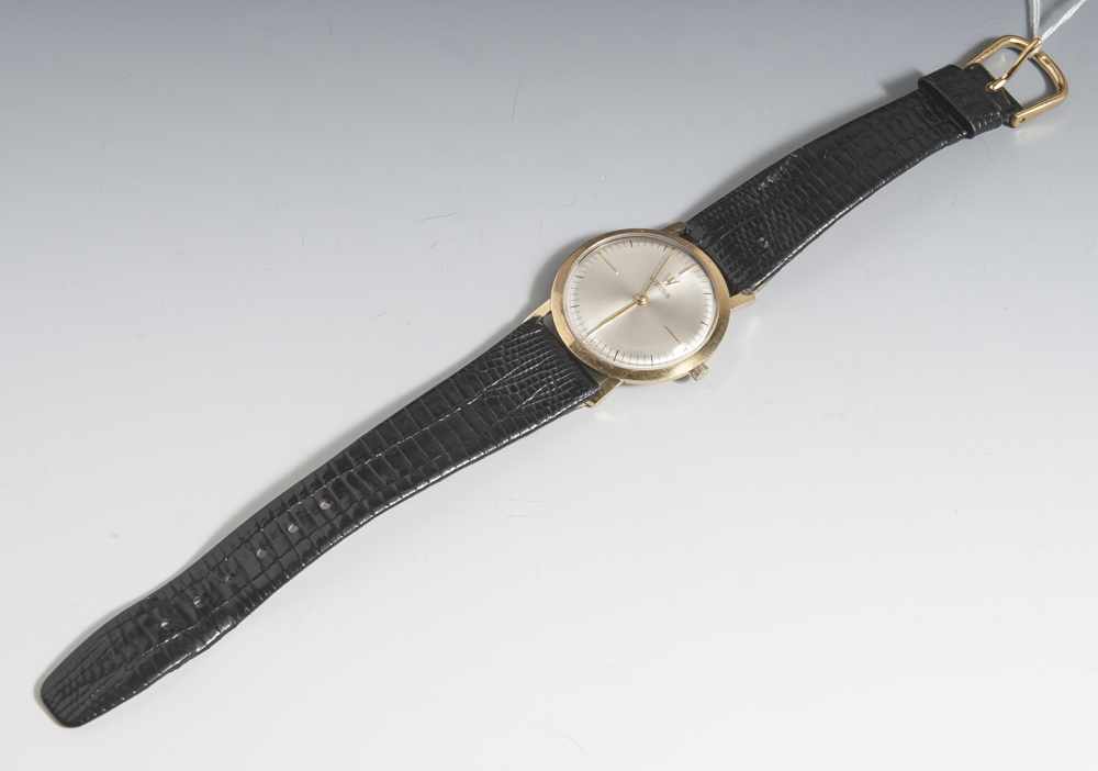 Herrenarmbanduhr, Herst. Uhren Weiss, wohl 1950/60er Jahre, flaches Gelbgoldgehäuse 750,