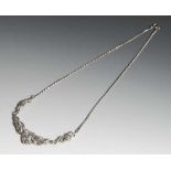 Collier, Silber, Schmuckteil durchbrochen gearbeitet mit Markasiten-Besatz, an filigranerS-