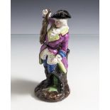 Figurine, Jäger mit erlegtem Hasen, 19. Jahrhundert, farbig staffiert. H. ca. 14 cm,Unterboden m.