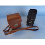 A Rolleiflex Camera No 105862 with case