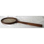 An early Concave Wooden Racket