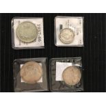 Four pre decimal coins: 1914 George 5th 2/6, 1916 George 5th Two Shilling, 1942 George 6th silver