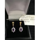 9ct gold, amethyst and created diamond earrings