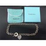 Tiffany and Co. Silver chain with heart pendant with box.