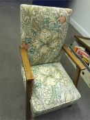 A recently covered child's chair in a classic shape.