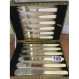 A set of bone handled fish knives and forks