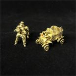 9ct gold charms, a poodle and car 16.9 g
