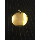 Gold circular pendant