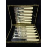 Boxed set of EPNS knives and forks